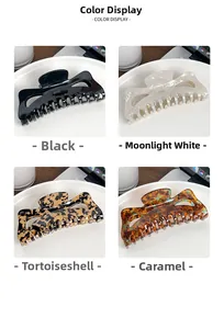Detailed color display of large hair claw clips in black white and caramel finishes