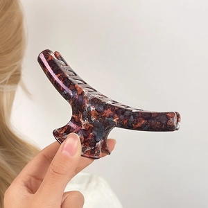 Large vintage tortoiseshell hair claw clip in purple and brown acetate for women