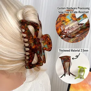 Oversized cutout bow hair claw clip in tortoiseshell resin with 2.5mm thickened material