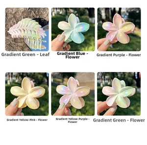 Iridescent gradient flower and leaf hair claws shown in a variety of vibrant colors