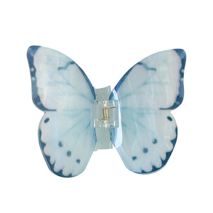 Pince à cheveux papillon en dégradé bleu et blanc avec ailes en acétate et ressort doré