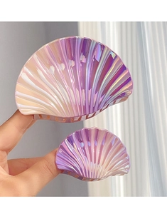 Detail of gradient purple shell hair claw clips with iridescent pearlescent finish