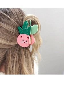 Pink cat face and green leaf acetate hair claw clip worn on blonde wavy hair