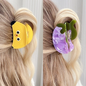 Cute fruit hair claws featuring banana and purple marble designs for women and girls