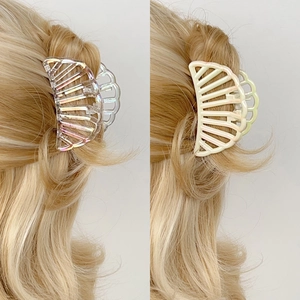 Holographic and pearl white half-round hollow claw clips for elegant hair styling