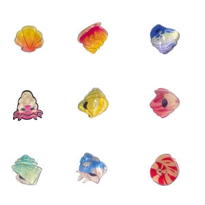 Set of 9 colorful acrylic marine life hair claws with seashell texture and ocean animal designs