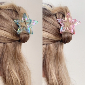 Star-shaped acrylic hair claws in iridescent pink and blue candy colors