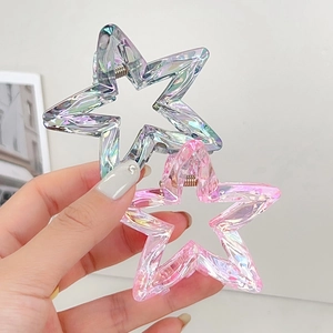 Star-shaped crystal candy colored hair claws in iridescent silver blue and pink