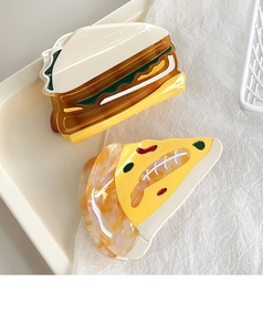 Detail of creative sandwich and pizza acetate hair claws with premium glossy finish
