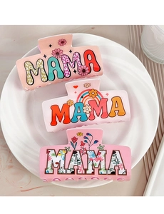 Detailed view of three pink acrylic MAMA hair claws with floral and rainbow patterns