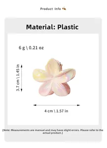 Detailed macro view showing the 4cm dimensions of the pink plumeria hair claw clip