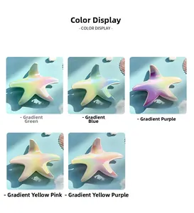 Detailed close-up of starfish hair claws in five gradient colors on beach-themed decor