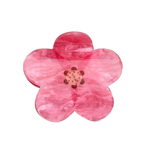 Elegant pink sunflower hair claw clip with marble texture for spring hairstyles