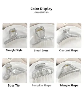 Collection of glitter silver hair claws in various shapes displayed on white plates