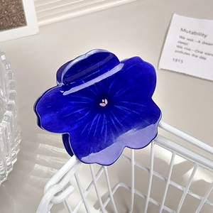 Elegant navy blue sunflower hair claw clip made of translucent acrylic for ponytails