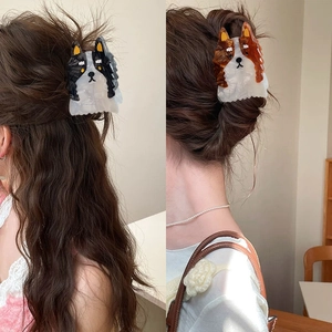 Pinces à cheveux Border Collie en acétate pour queues de cheval en noir et marron
