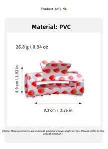 Detail view of strawberry pattern PVC hair claw clip with size and weight specs