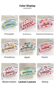Detailed collection of nine fruit pattern hair claws in a grid display layout