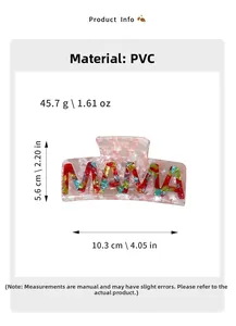 Detail view of large PVC hair claw with MAMA lettering and 10.3cm measurement guide