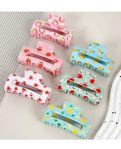 Set of 6 colorful acrylic hair claws with cute strawberry, pineapple, and watermelon patterns