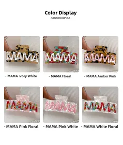 Detail view of large MAMA hair claws in six different colorful acetate patterns