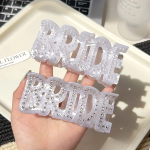 Lot de deux pinces à cheveux BRIDE mauves ornées de perles et de strass brillants