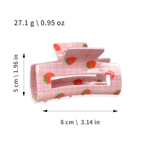Pink checkered hair claw clip with strawberry and daisy prints showing 8cm dimensions