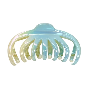Iridescent gradient octopus hair claw clip with aurora finish on white background