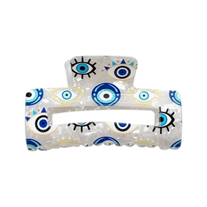 Haarklammer aus weißem Marmor mit blauem Evil Eye Muster und robuster Metallfeder