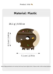 Detail showing donut hair claw dimensions and weight of 26.1g made of plastic