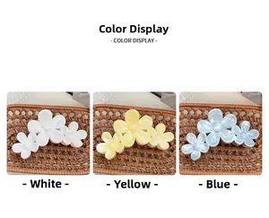 Detailed comparison of large floral hair claws in white, yellow and blue pastel tones
