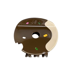 Chocolate donut hair claw clip with colorful sprinkles and sweet bite design for women