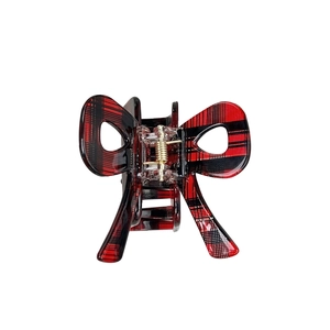 Elegant red plaid bow hair claw clip made of acetate with a vintage check pattern