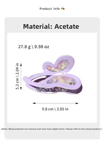 Detailed view of purple acetate butterfly hair claw with pearlescent shell texture details