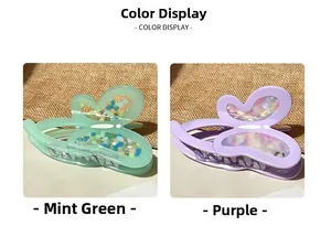 Detailed macro of acetate butterfly hair claw clips with colorful glitter inlay wings