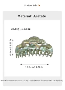 Detailed view of large marble acetate hair claw clip with dimensions and weight info