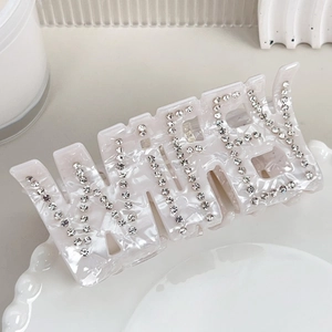 Pince à cheveux WIFEY blanche nacrée avec strass et texture marbrée pour femmes élégantes