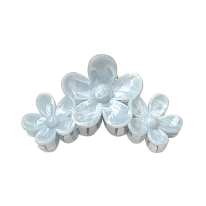Elegant light blue acetate flower hair claw clip with marble texture and large shark grip