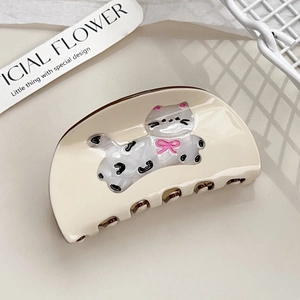 Creamy white acetate shark hair claw clip with a cute resin cat and pink bow