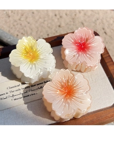 Three-piece set of small gradient plumeria hair claws in pink yellow and peach orange