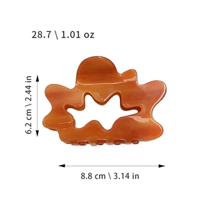 French hollow cloud hair claw clip in amber acetate with size and weight dimensions