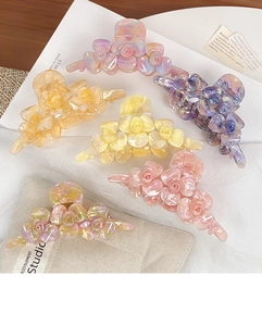 Set aus sechs Blumen-Haarklammern in verschiedenen Farben mit marmorierter Acetat-Struktur