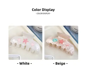 Détails des pinces à cheveux sur le thème marin en blanc et beige avec étoiles de mer et coquillages