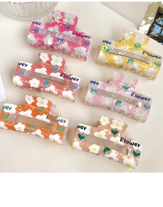 Set mit 6 bunten Haarklammern mit Gänseblümchen-Druck und rechteckigem Hohlraum-Design