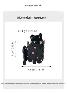 Vue détaillée de la pince à cheveux chat en acétate noir à pois roses avec dimensions