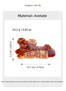 Detailed view of dog-shaped cellulose acetate hair comb with amber shell texture