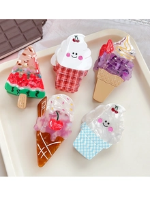 Close-up of acetic acid hair clips featuring cute ice cream and watermelon sundae designs