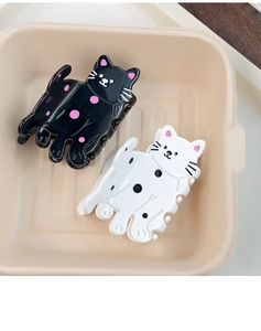 Détails de pinces à cheveux chat mignonnes en noir et blanc avec motifs à pois