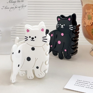 Pinces à cheveux chat mignonnes à pois noirs et blancs avec finition en acétate
