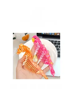 Detailed close-up of seahorse and parrot hair combs with marble acetate texture and finish